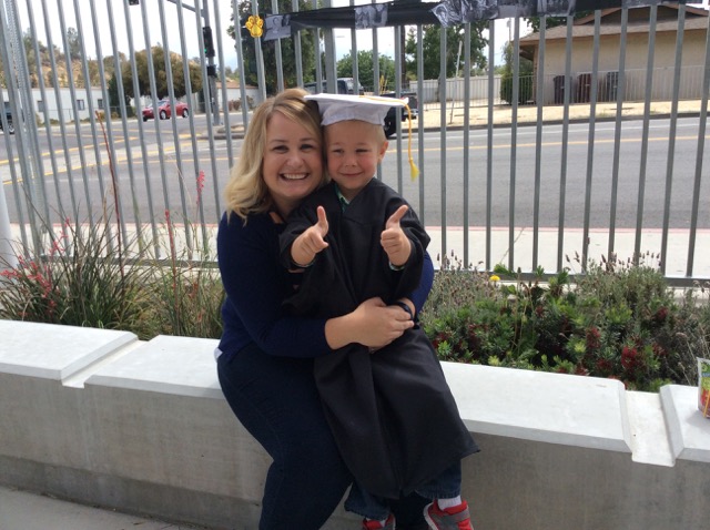 A photo of Hiatt and Mom at pre-school graduation